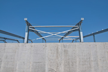 Structure of steel for building construction. The steel structure of the new building for further construction. Metal frame for the installation of insulation panels.