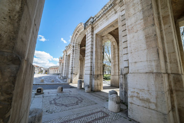 passage with columns and arches. Church of San Antonio in Aranjuez, Madrid, Spain. Stone arches and walkway linked to the Palace of Aranjuez