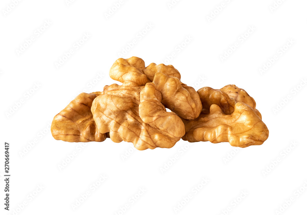 Wall mural walnuts heap in closeup isolated on white clipping path included