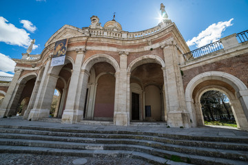 Fototapeta na wymiar Tourism, Church of San Antonio in Aranjuez, Madrid, Spain. Stone arches and walkway linked to the Palace of Aranjuez