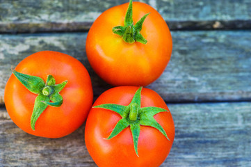 tomatoes on a wooden table