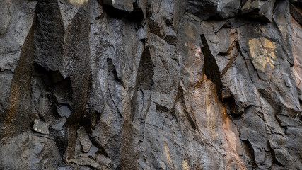Cracks in the cave in basalt rocks