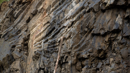 Cracks in the cave in basalt rocks