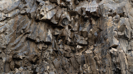 Cracks in the cave in basalt rocks