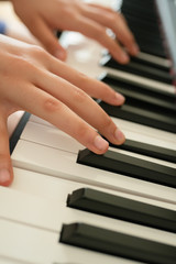 Fototapeta premium piano keys and playing piano