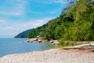 Sand, sea, sky, green mountains