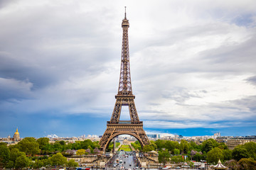 Aerial view of Tower Eiffel on beautiful cloudy sky in Paris, France