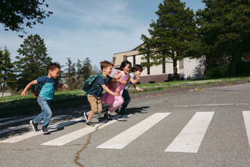 Running preschool kids outside