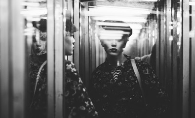 Portrait in mirror cabinet