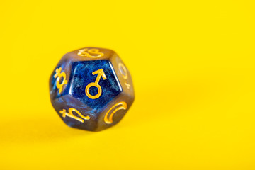Astrology Dice with symbol of the planet Mars on Yellow Background
