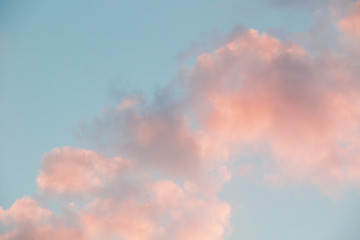 pastel pink cumulus clouds backgrond