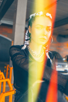 Confident swag woman in red light
