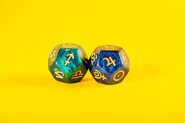 Astrology Dice with zodiac symbol of Sagittarius Nov 22 - Dec 21 and its ruling planet Jupiter on...