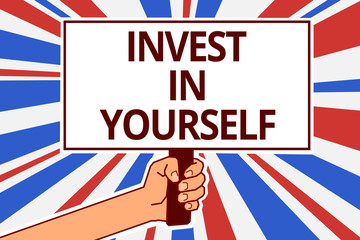 Handwriting text Invest In Yourself. Concept meaning Improve your Skills take courses Do masters Scholarship Paper text capital placards signboards announcement reporting cardboards