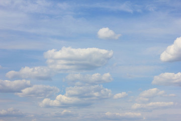 Cloudy blue sky nature view with fluffy white clouds 