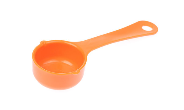 orange plastic scoop isolated on white background