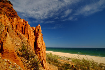 Red rocks on the Praia da Falesia - Falesia beach in Algarve, Portugal.