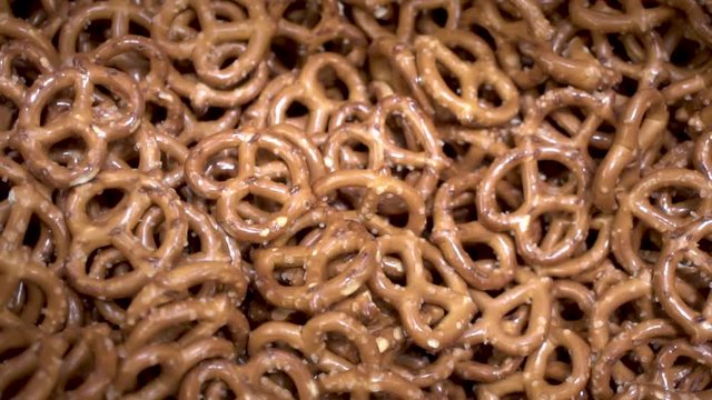 Heap of hard pretzels in bulk, Close Up Isolated Top View