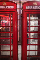 English telephone booth at night in London - London, UK