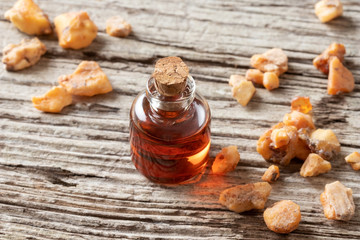 A bottle of styrax benzoin essential oil and benzoin resin