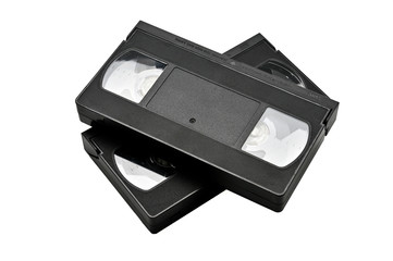 Videotapes for home use on a white background.Videocassette
