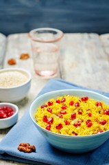 Turmeric quinoa with pomegranate and walnuts