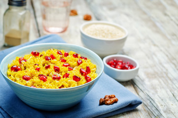 Turmeric quinoa with pomegranate and walnuts