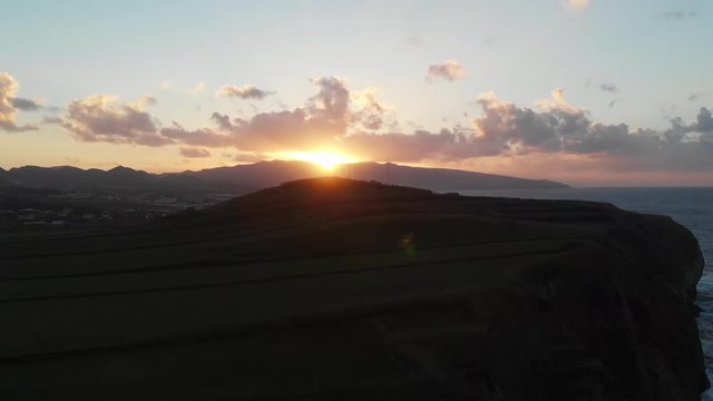 aerial drone Azores Portugal sunset in the mountains reveal