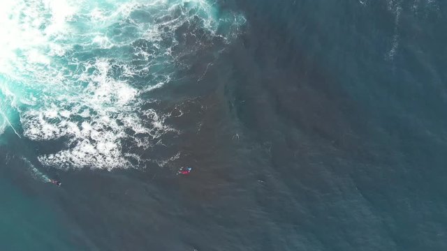 Aerial Drone Azores Portugal Scuba Divers swim through waves