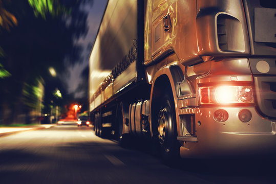 Truck At Night Road In Selective Focus