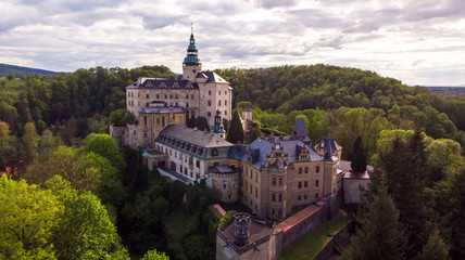 Fototapeta na wymiar Aerial view of Medieval Gothic and Renaissance style castle on top of the hill in Frydlant, Czech Republic.