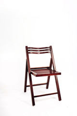 wooden chair on a white background. garden folding chair made of wood.