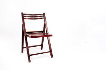 wooden chair on a white background. garden folding chair made of wood.