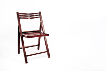 wooden chair on a white background. garden folding chair made of wood.