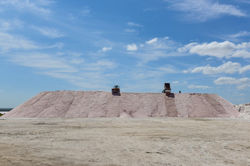 Fototapeta na wymiar Salty lagoon prepared to extract raw salt, mining industry in Argentina
