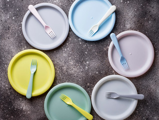 Colorful plastic dishes for summer picnic