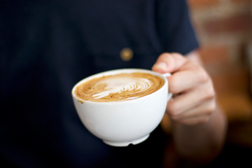 cup of coffee being served