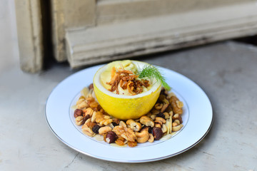 ice cream served in passion fruit shell