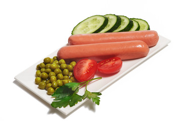 Snack with sausages, cucumber, tomatos and canned peas on white background, isolated