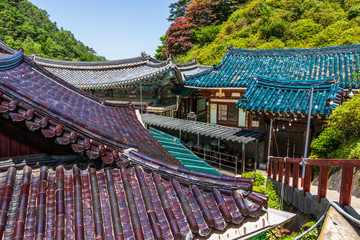 Fototapeta premium Panoramic view on Roof and Buildings inside korean Buddhist Temple complex Guinsa. Guinsa, Danyang Region, South Korea, Asia.