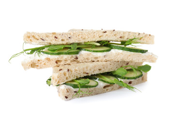 Fresh tasty cucumber sandwiches isolated on white