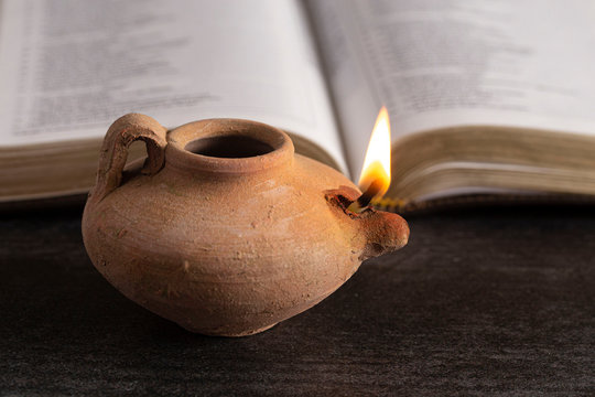 Lit Ancient Oil Lamp with an Open Bible Thy Word is a Lamp Unto My Feet
