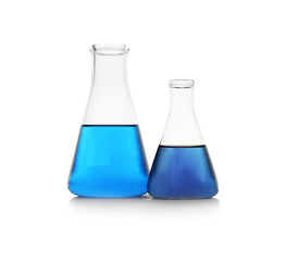 Chemistry glassware with color samples isolated on white