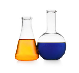 Chemistry glassware with color samples isolated on white