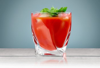 Glass of alcohol  cocktail on background