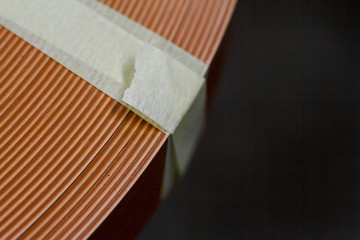 Furniture accessories. Multicolored bobbins of PVC edge and melanin for the manufacture of furniture. Lie pyramid.