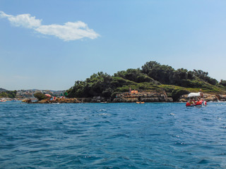 View of the rocky shore of Three island beach.