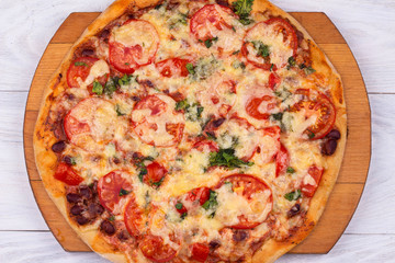 Top view of domestic Italian pizza on white background