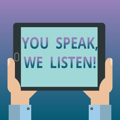 Handwriting text writing You Speak We Listen. Concept meaning Communicate to us your feelings and information Hu analysis Hand Holding Blank Screen Tablet Smartphone Display Unit photo