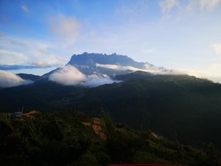 Beautiful sunrise overlooking Mount Kinabalu on a bike journey